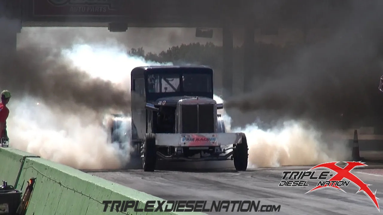BIG RIGS BATTLE IT OUT ON THE DRAG STRIP!!
