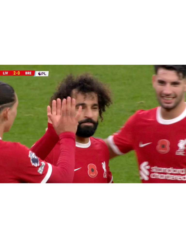 Salah heads home the second